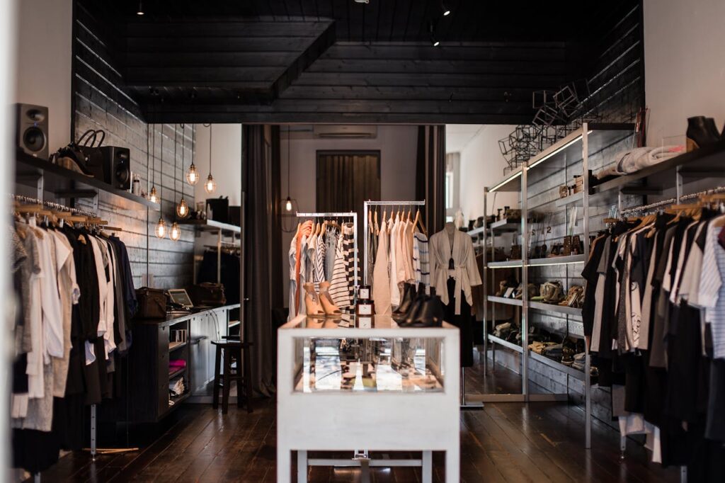 Modern retail store environment showing customers shopping during in-store audio experience